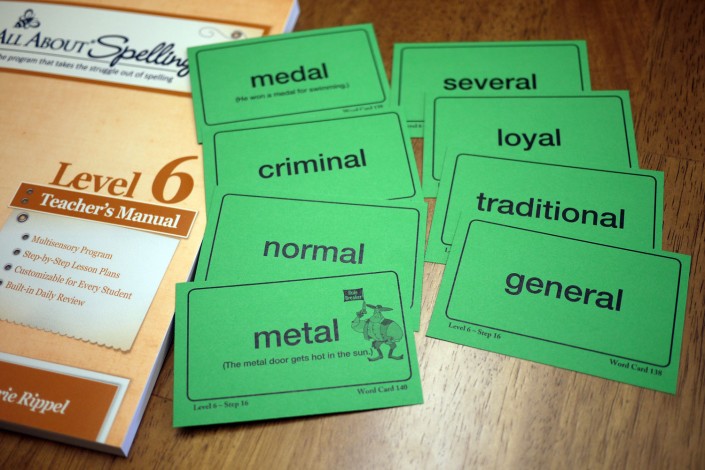 Word cards next to All About Spelling Level 6 Teacher's Manual