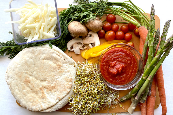 Ingredients for very veggie pizzas
