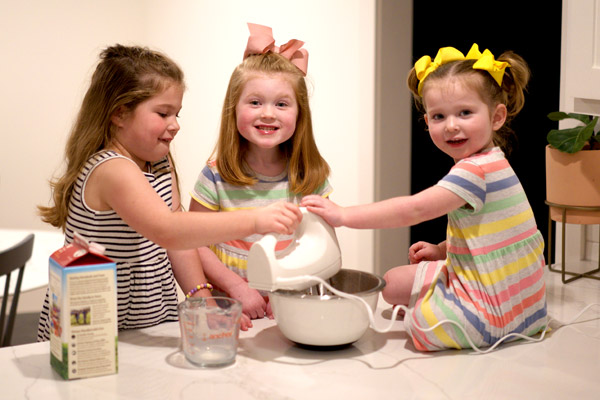 Children mixing pudding