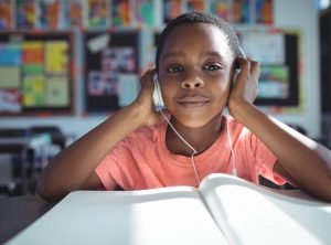 boy listening to a book on tape