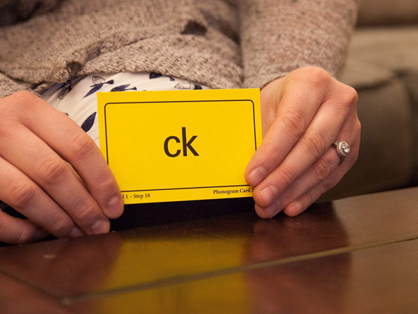 Woman holding Phonogram Card 'ck'