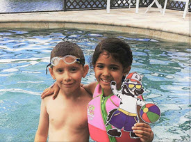 two children swimming with flat ziggy