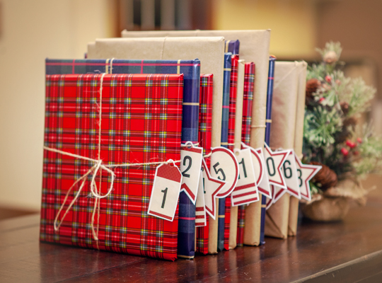wrapped books with advent calendar tags