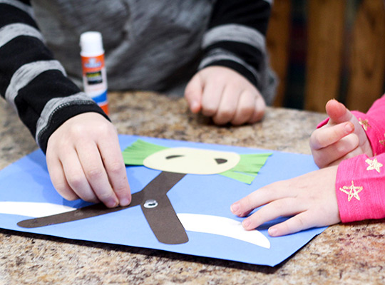children assemble letter y craft