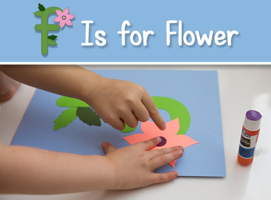 children attach flower to lowercase F craft
