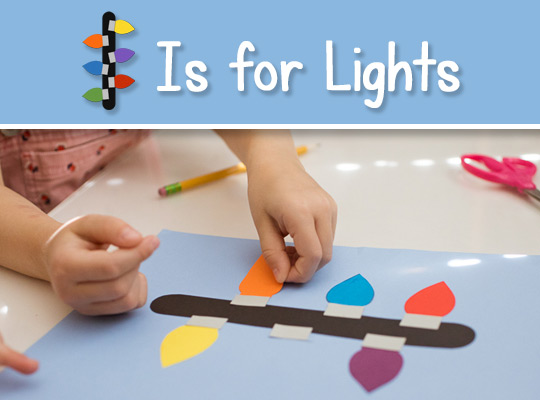 child adds light to lowercase L craft