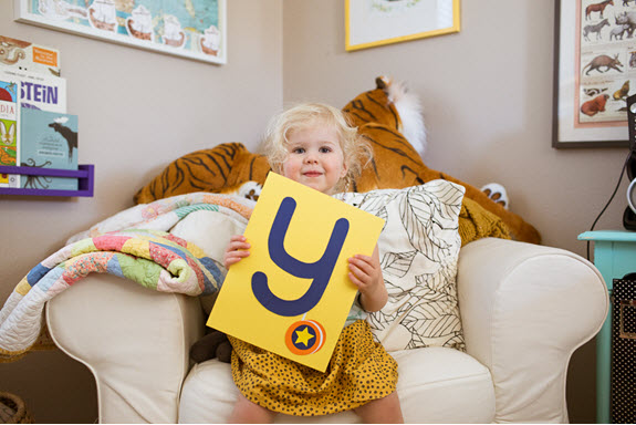child displays her lowercase y craft