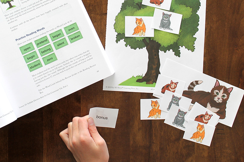 Child playing activity to review word cards
