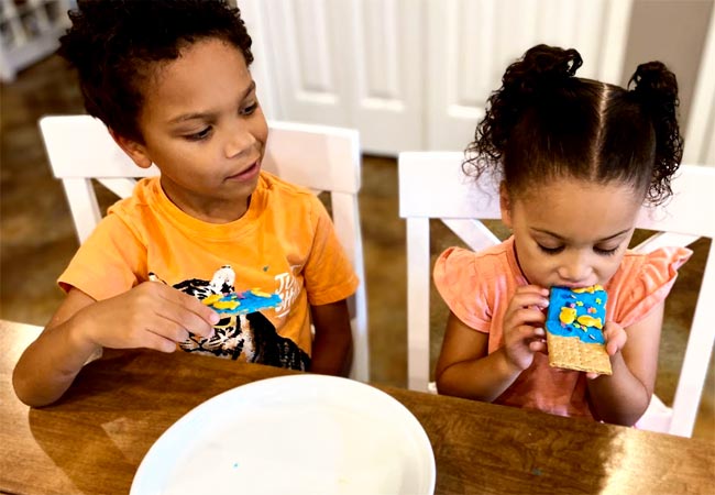 Children eats ABC snack