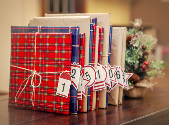 wrapped books with advent calendar tags