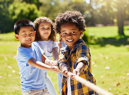 Children playing tug-of-war